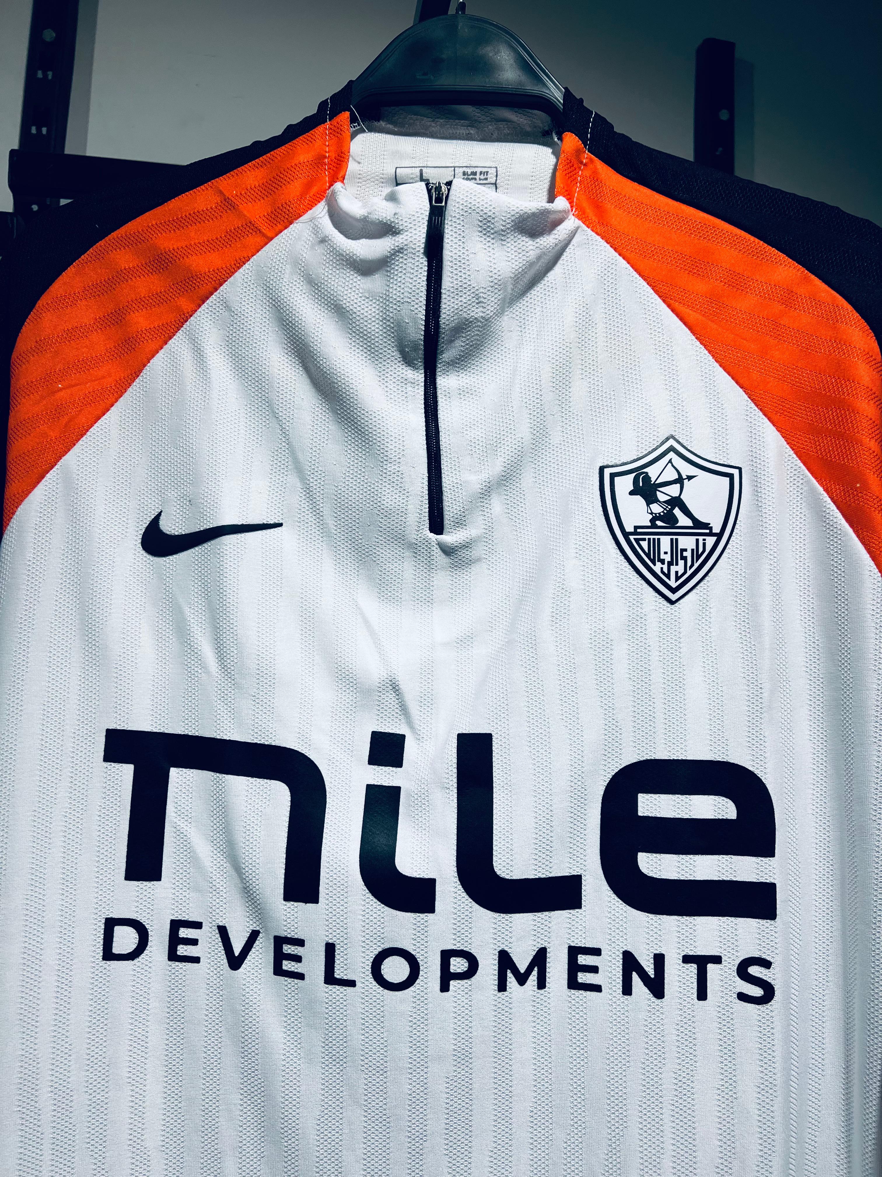 تراك زمالك ابيض ف برتقالي thumbnail