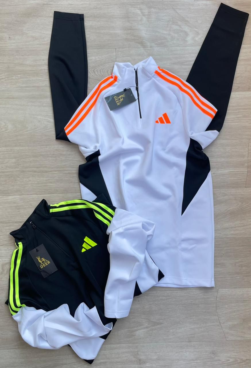 تراك اديداس ابيض ف برتقالي